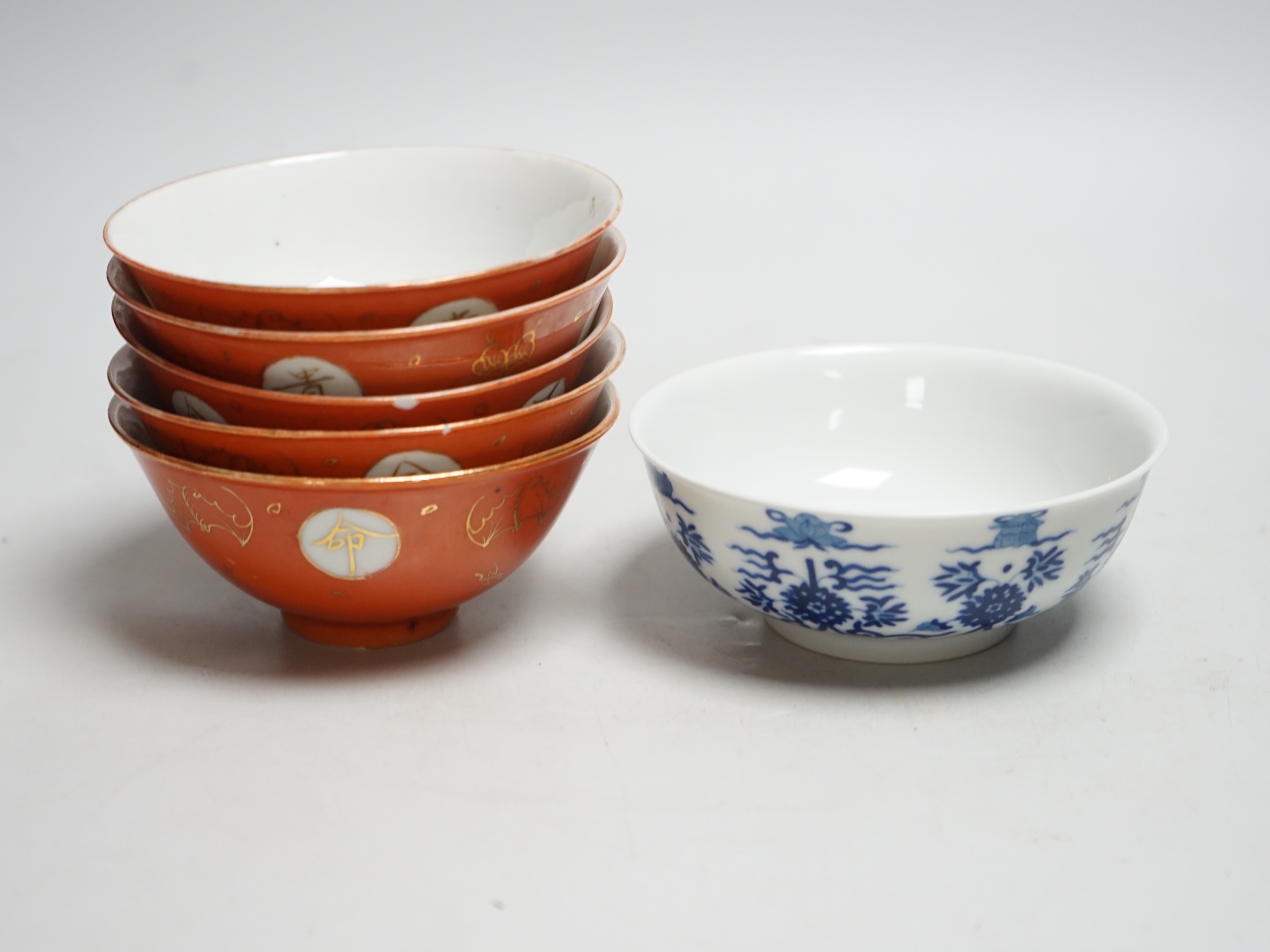 Five Chinese coral ground bowls and a blue and white bowl, 13cm (6)